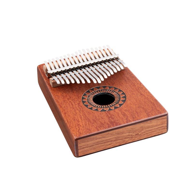 Meinl kalimba, design zvukového otvoru, sluneční motiv